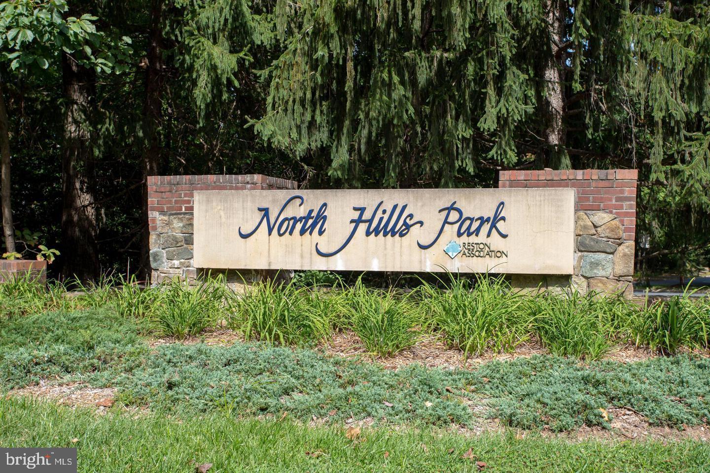 1393 Heritage Oak Way Reston, VA 20194 - Photo 59 of 80 a sign that is sitting in front of a building