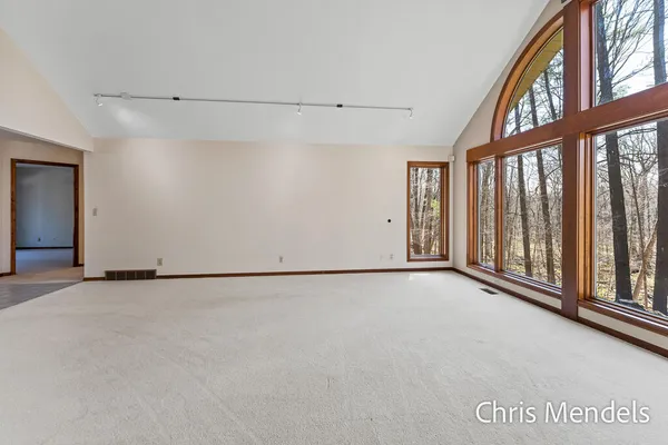 $574,000 | 3140 Riverwoods Drive Northeast, Rockford, MI 49341