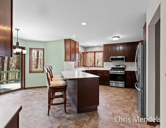 $574,000 | 3140 Riverwoods Drive Northeast, Rockford, MI 49341