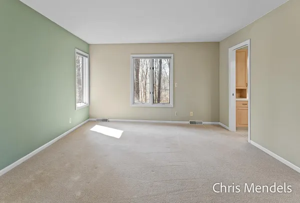 $574,000 | 3140 Riverwoods Drive Northeast, Rockford, MI 49341
