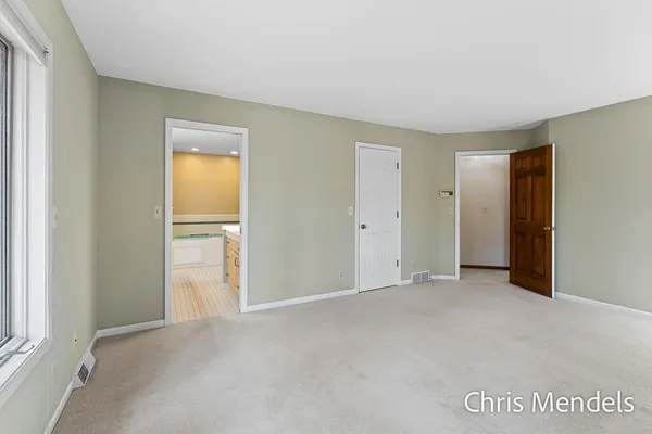 $574,000 | 3140 Riverwoods Drive Northeast, Rockford, MI 49341