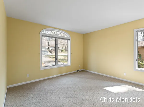 $574,000 | 3140 Riverwoods Drive Northeast, Rockford, MI 49341