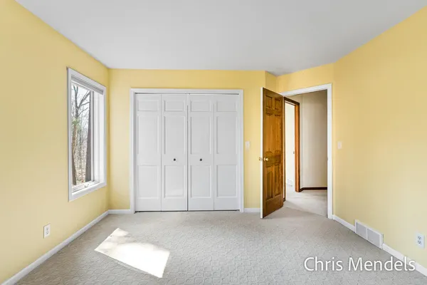 $574,000 | 3140 Riverwoods Drive Northeast, Rockford, MI 49341