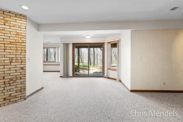 $574,000 | 3140 Riverwoods Drive Northeast, Rockford, MI 49341