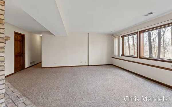 $574,000 | 3140 Riverwoods Drive Northeast, Rockford, MI 49341