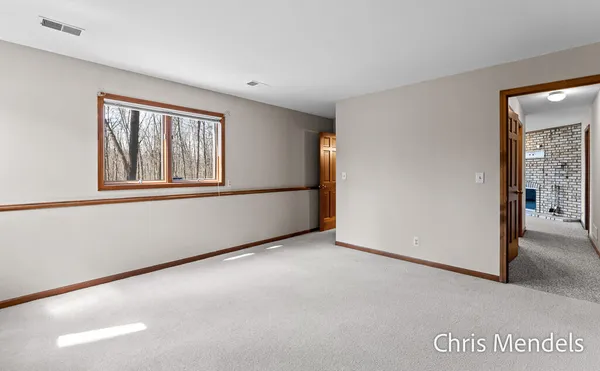 $574,000 | 3140 Riverwoods Drive Northeast, Rockford, MI 49341