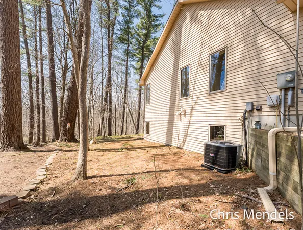 $574,000 | 3140 Riverwoods Drive Northeast, Rockford, MI 49341