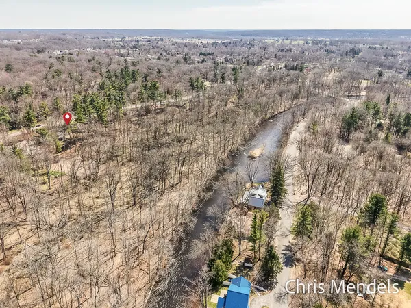 $574,000 | 3140 Riverwoods Drive Northeast, Rockford, MI 49341