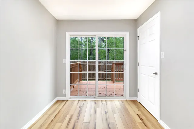 a view of a room with a large window