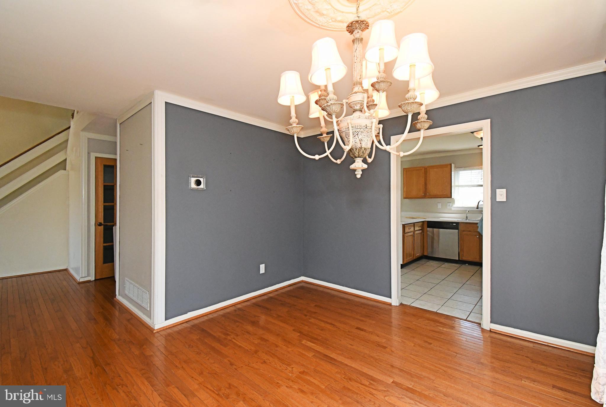 502 King Road Collegeville, PA 19426 - Photo 12 of 45 a view of a room with wooden floor and a chandelier