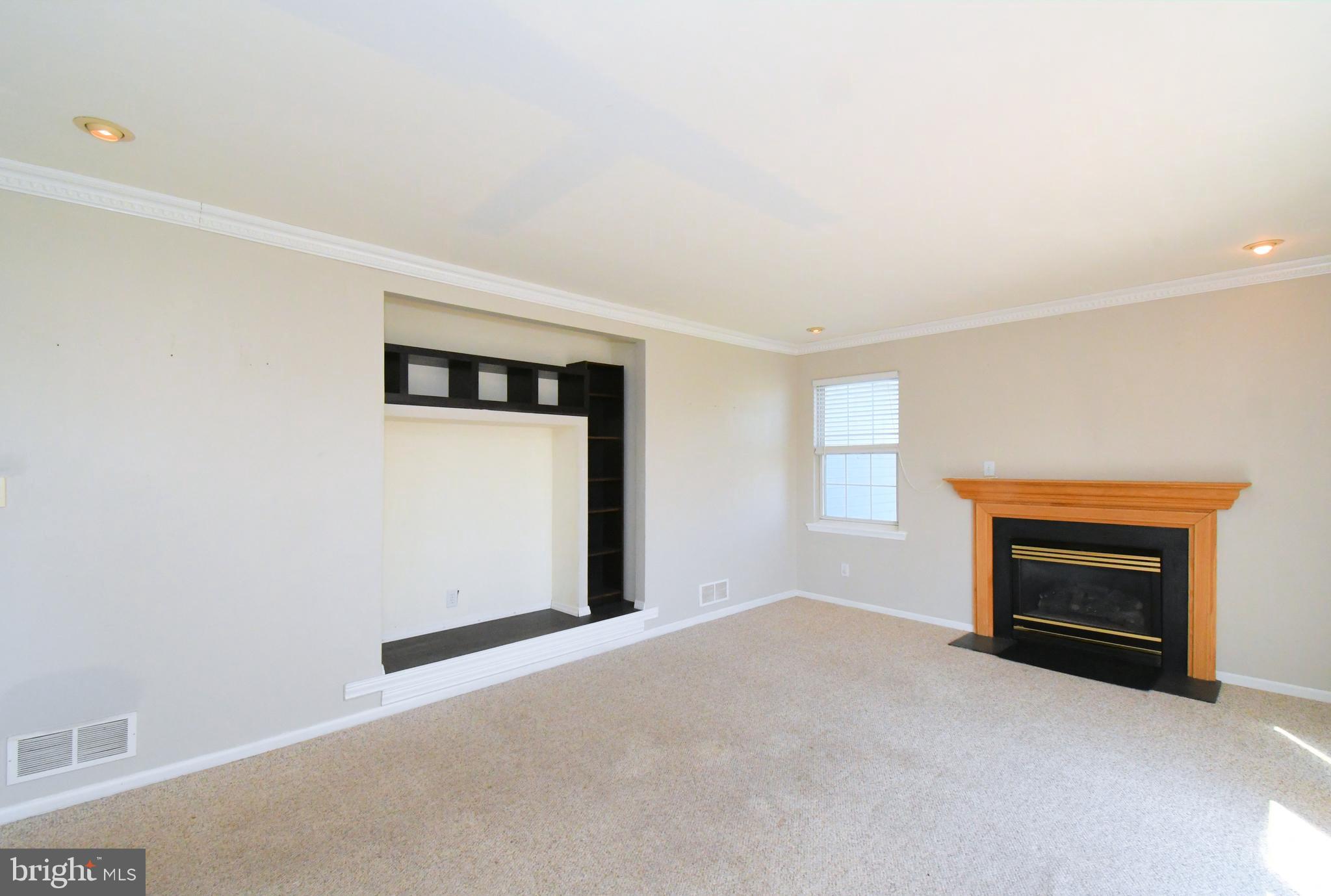 502 King Road Collegeville, PA 19426 - Photo 19 of 45 a view of empty room with a fireplace