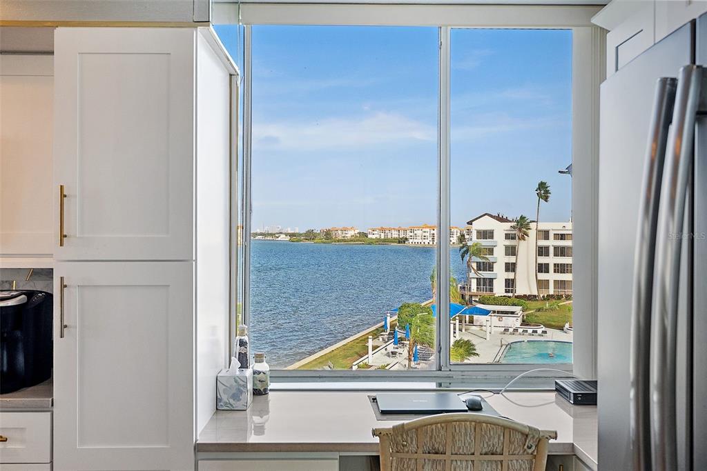5279 Isla Key Boulevard South, Unit 417 St. Petersburg, FL 33715 - Photo 12 of 40 a bathroom with a window and a shower