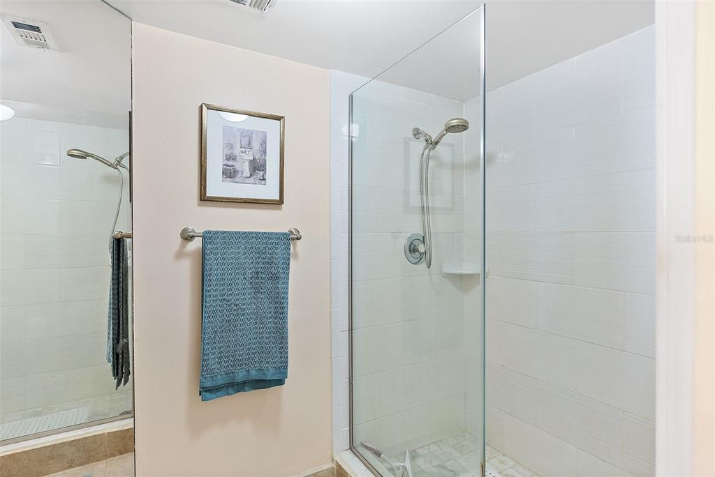 5279 Isla Key Boulevard South, Unit 417 St. Petersburg, FL 33715 - Photo 22 of 40 a bathroom with a shower