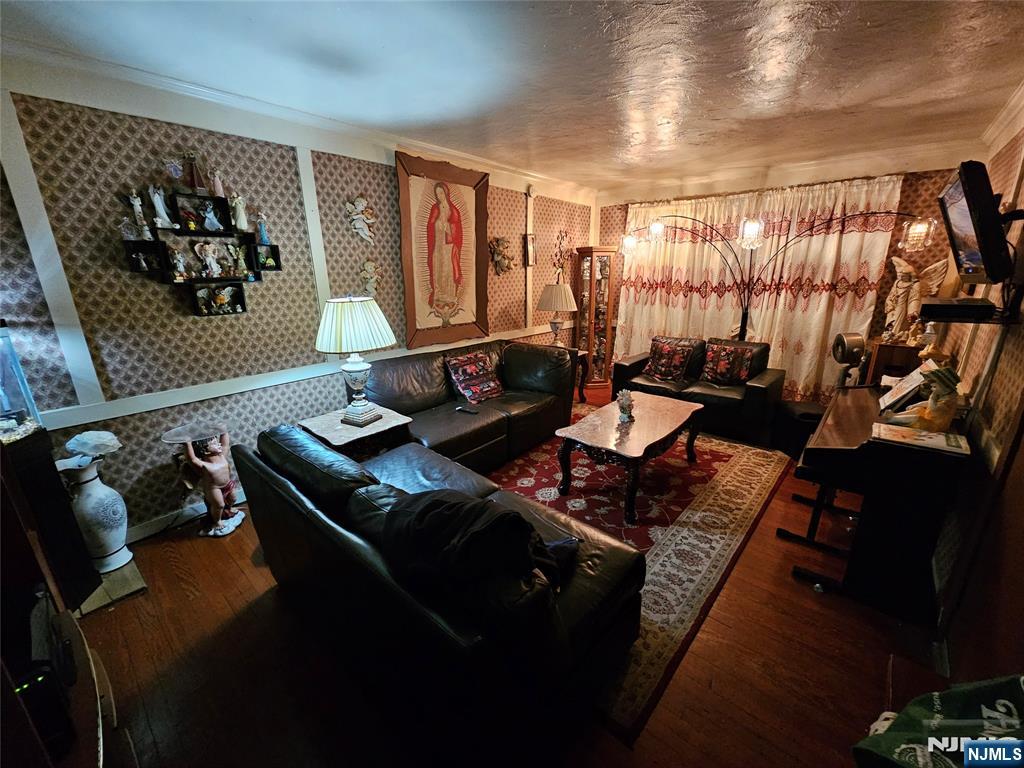 58-60 Murray Avenue Paterson, NJ 07501 - Photo 5 of 5 a living room with furniture
