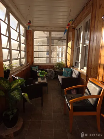 a room with furniture and a window