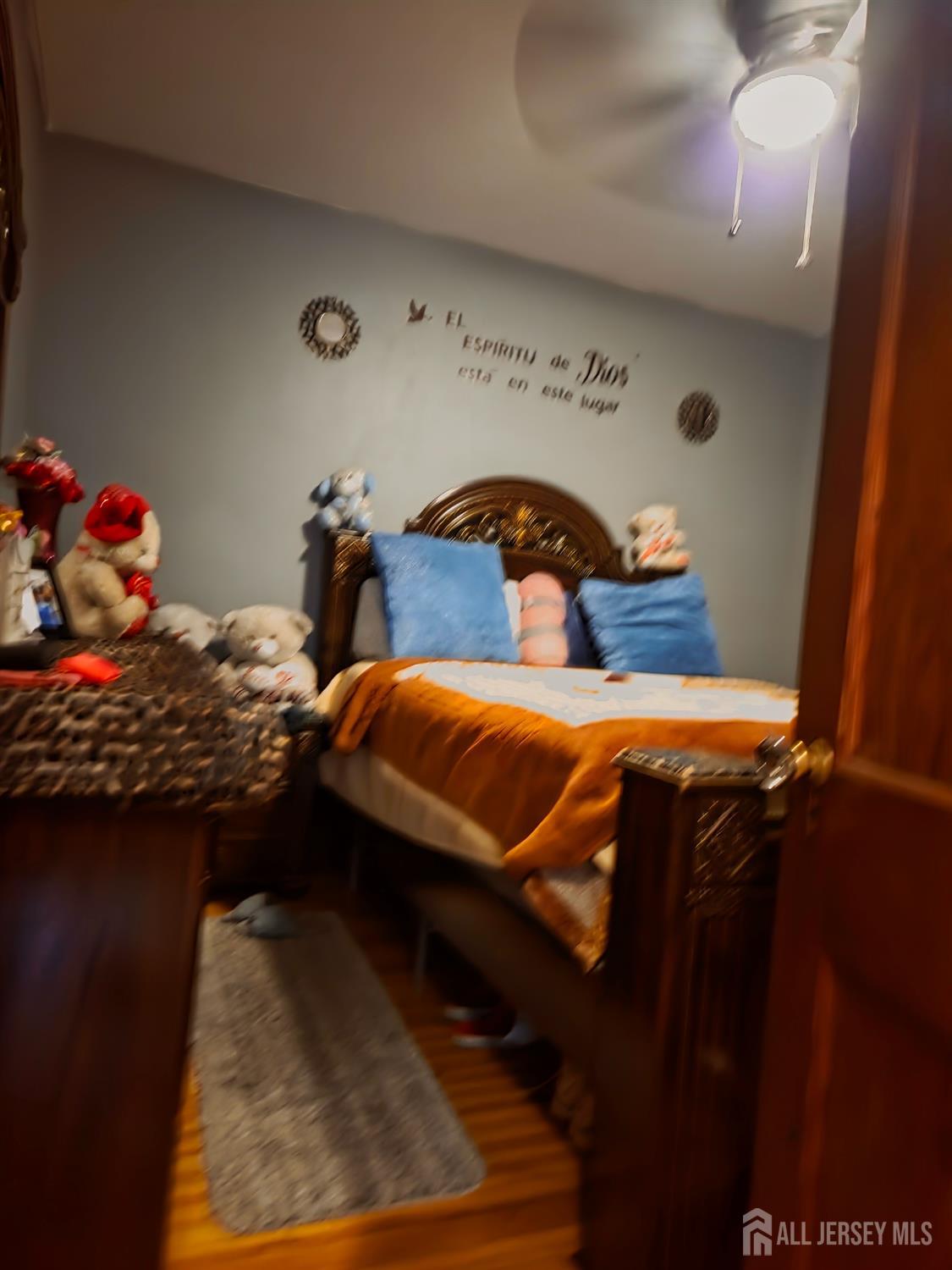 552 Compton Avenue Perth Amboy, NJ 08861 - Photo 5 of 13 a bedroom with two beds and a dresser