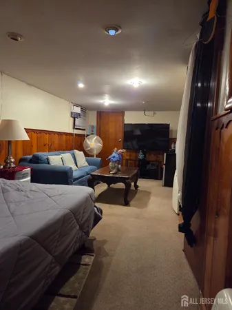 a bed room with bed and a lamp