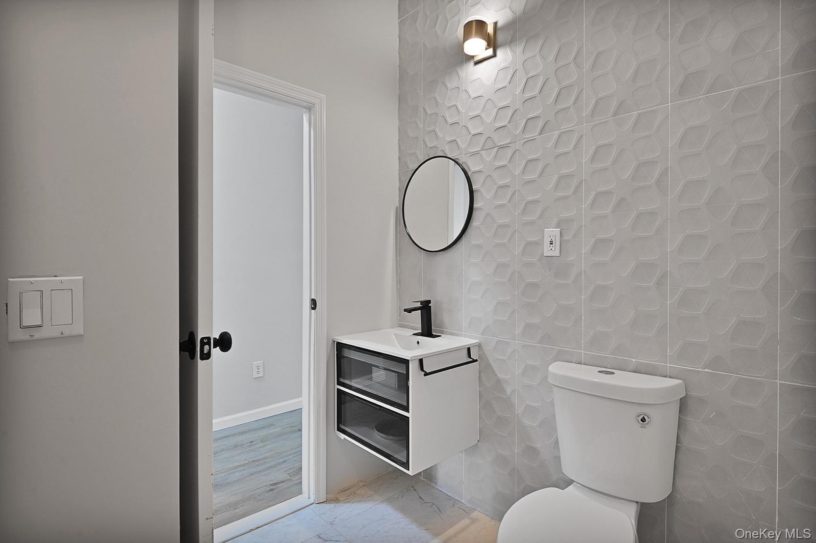 386 Airport Road Liberty, NY 12754 - Photo 12 of 21 a bathroom with a sink a toilet and a shower