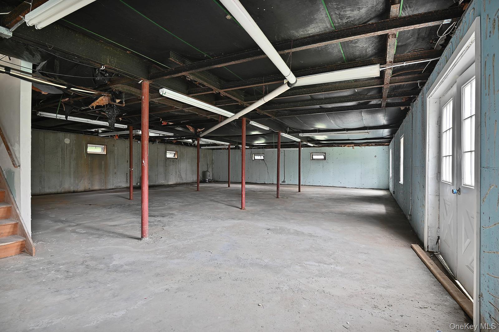 386 Airport Road Liberty, NY 12754 - Photo 19 of 21 a view of an empty room with wooden walls