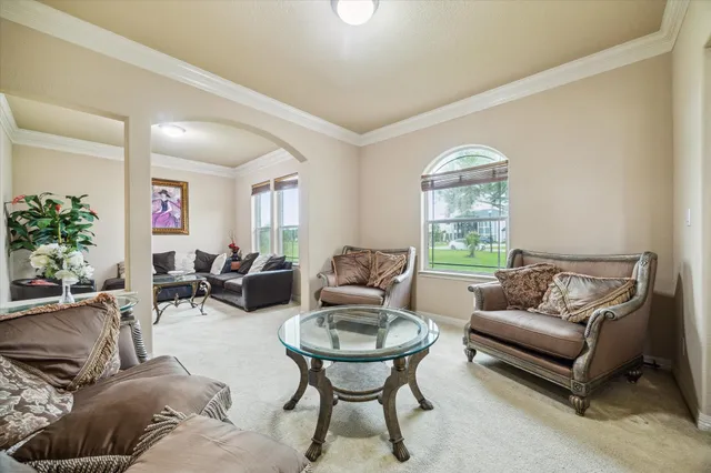 a bathroom with a double vanity sink mirror and toilet