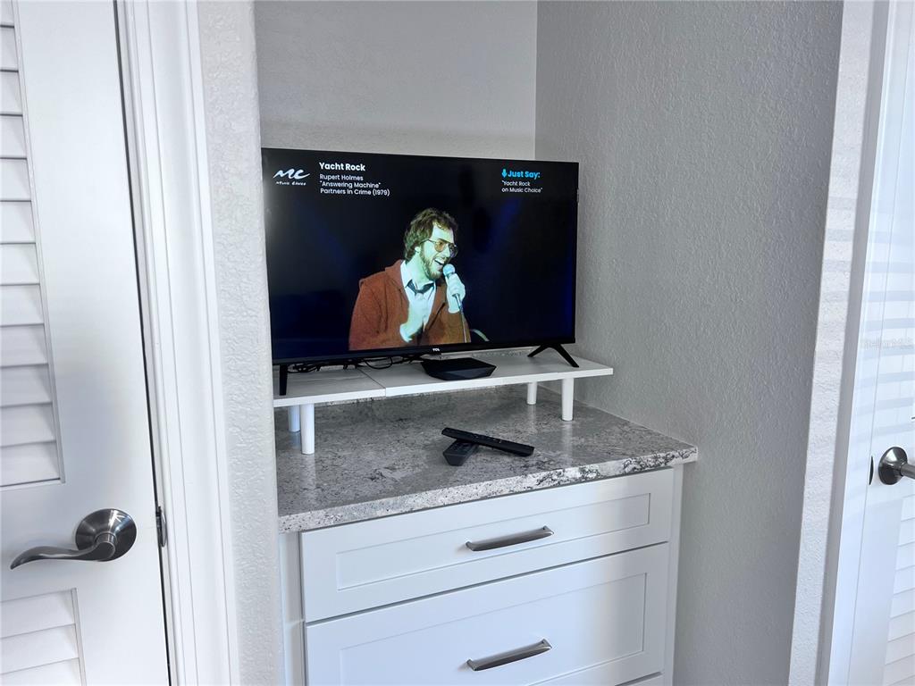 6154 Midnight Pass Road, Unit A11 Sarasota, FL 34242 - Photo 13 of 22 a close view of shoes and tap