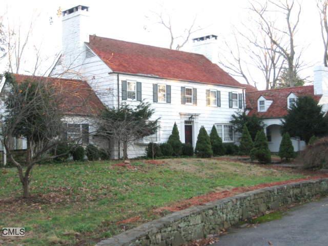 290 Guinea Road Stamford, CT 06903 - Photo 1 of 1 a front view of a house with a garden