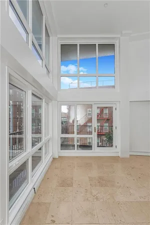view of an empty room with a window