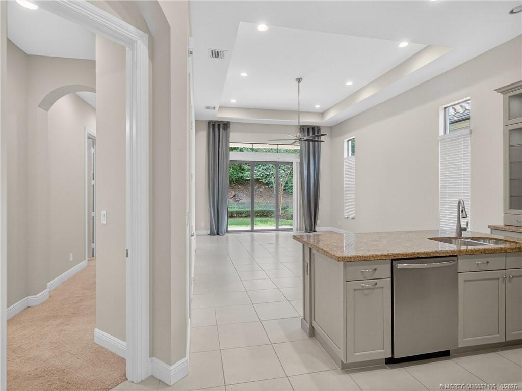 600 Southeast Fascino Circle Port St. Lucie, FL 34984 - Photo 11 of 22 a view of a kitchen with a sink and cabinets