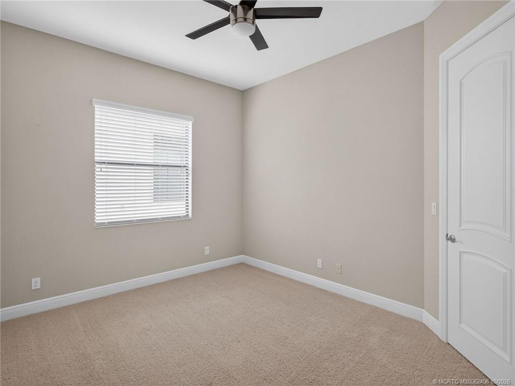 600 Southeast Fascino Circle Port St. Lucie, FL 34984 - Photo 19 of 22 an empty room with a window