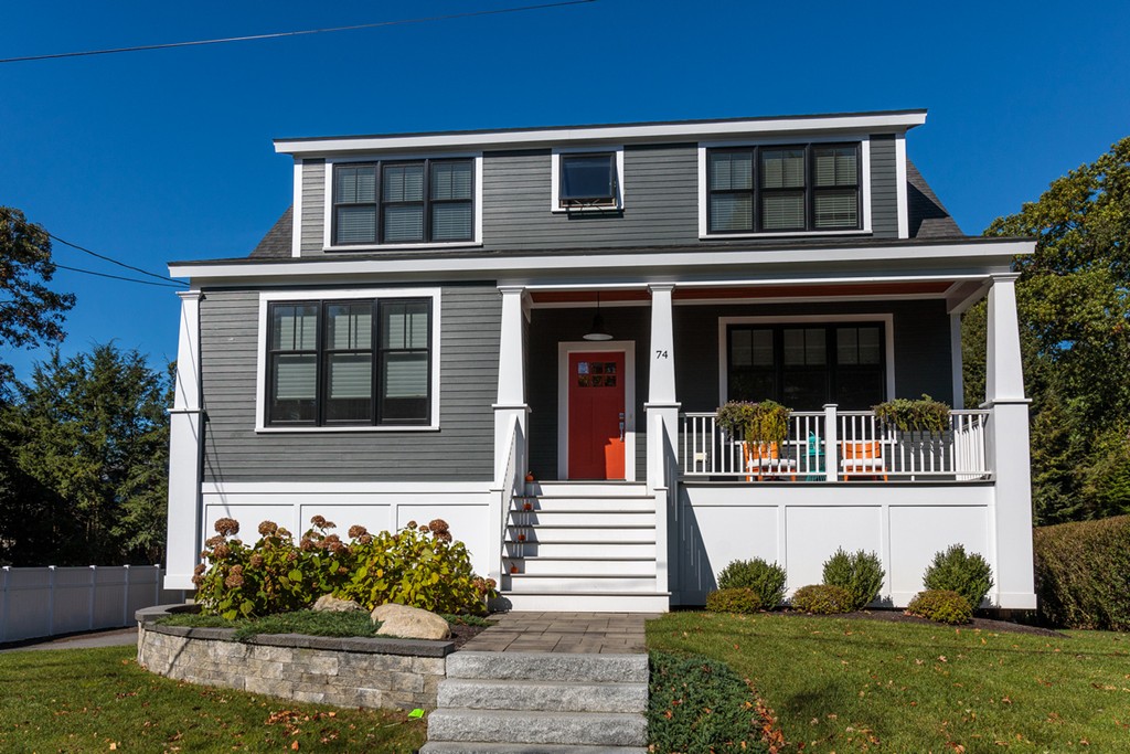 74 Hillcrest Road Needham, MA 02492 - Photo 1 of 29 a front view of a house with a yard