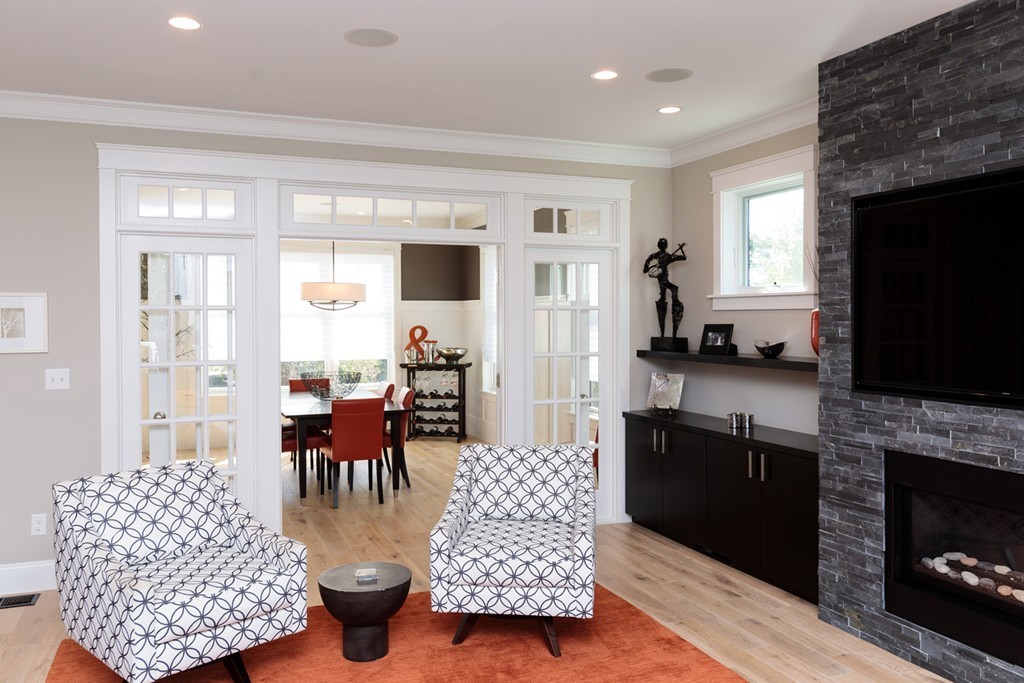 74 Hillcrest Road Needham, MA 02492 - Photo 7 of 29 a living room with furniture and a fireplace