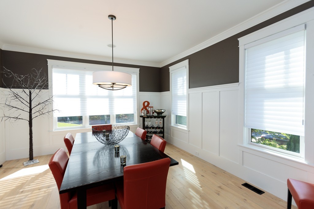 74 Hillcrest Road Needham, MA 02492 - Photo 9 of 29 a living room with furniture dining table and a large window
