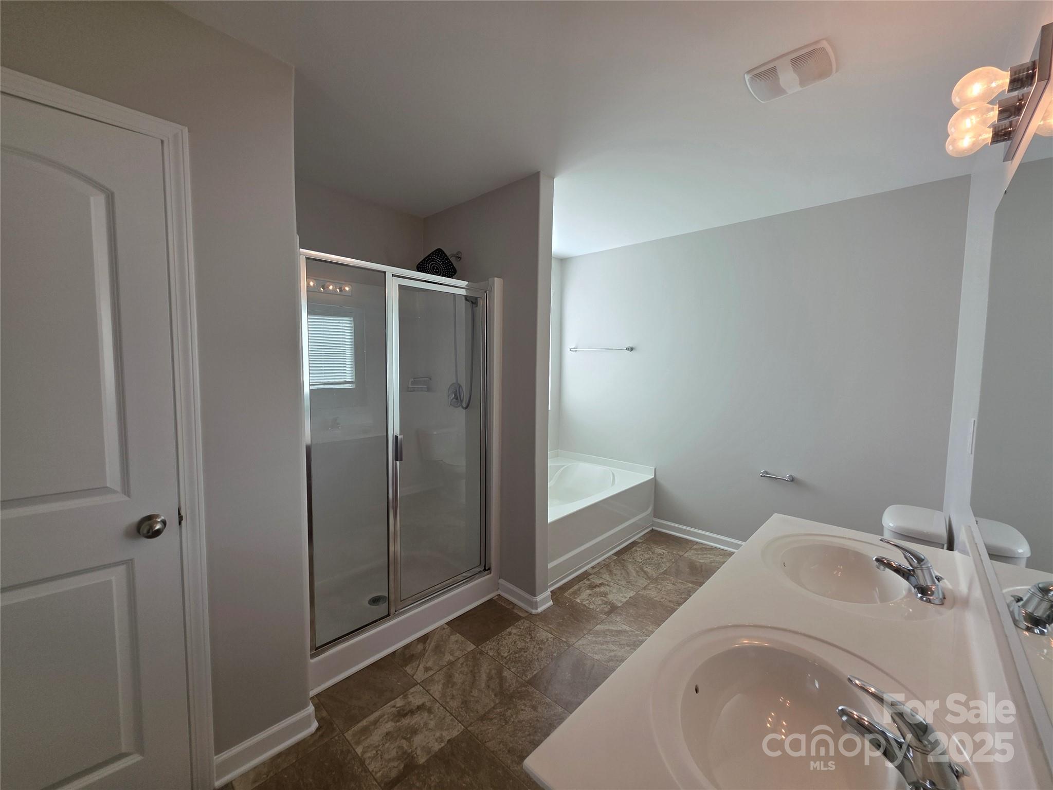 1047 Mackey Court Gastonia, NC 28056 - Photo 12 of 30 a bathroom with a sink and shower