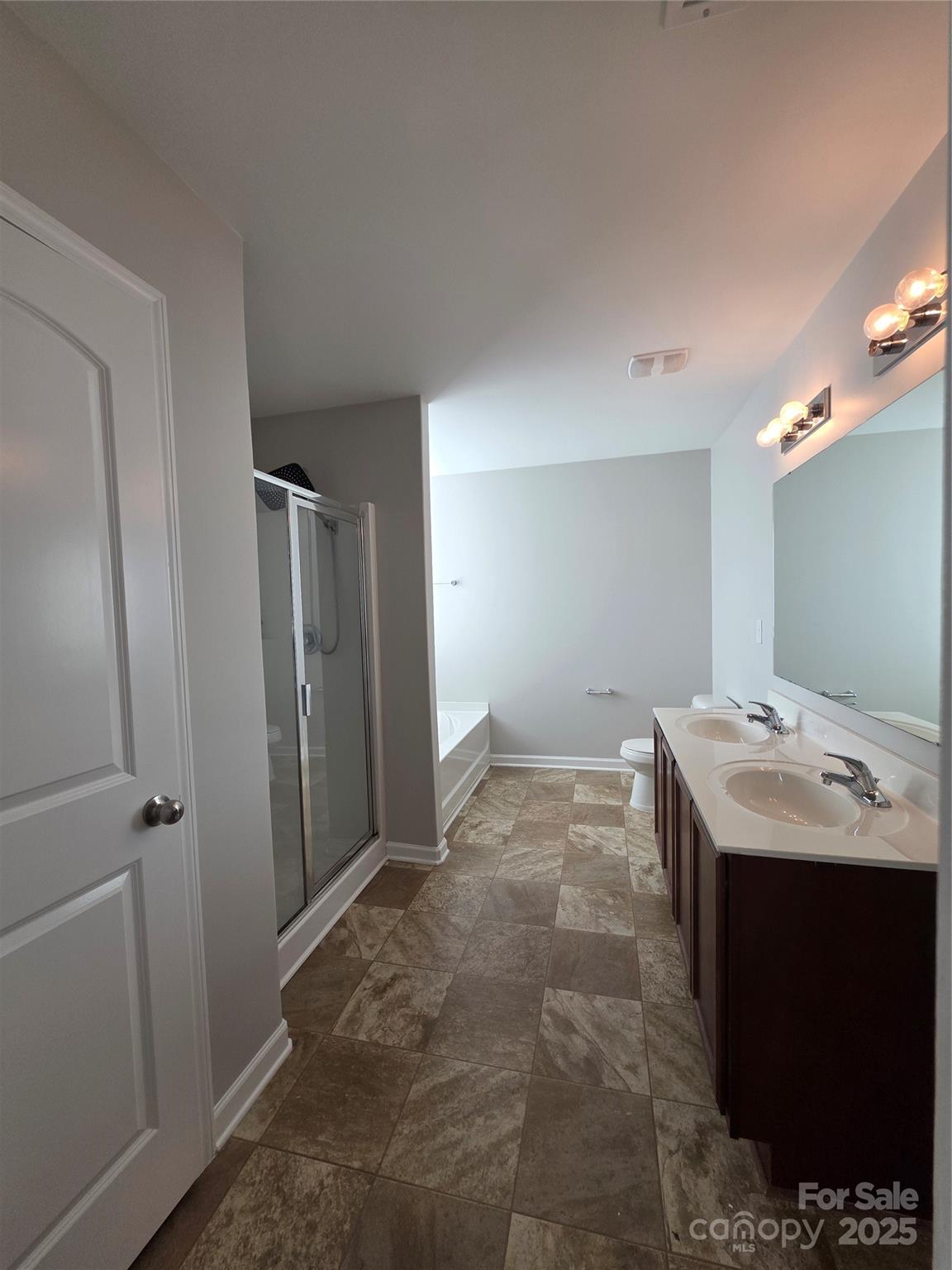 1047 Mackey Court Gastonia, NC 28056 - Photo 13 of 30 a view of a bathroom with a sink and mirror