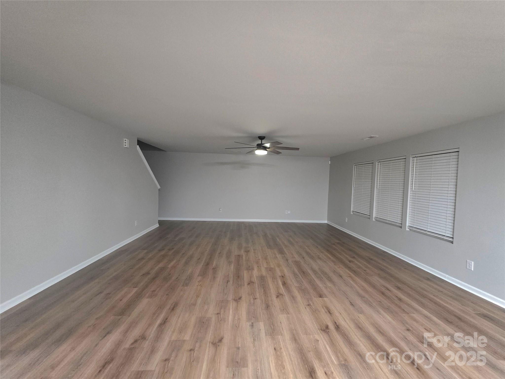 1047 Mackey Court Gastonia, NC 28056 - Photo 28 of 30 a view of empty room with wooden floor