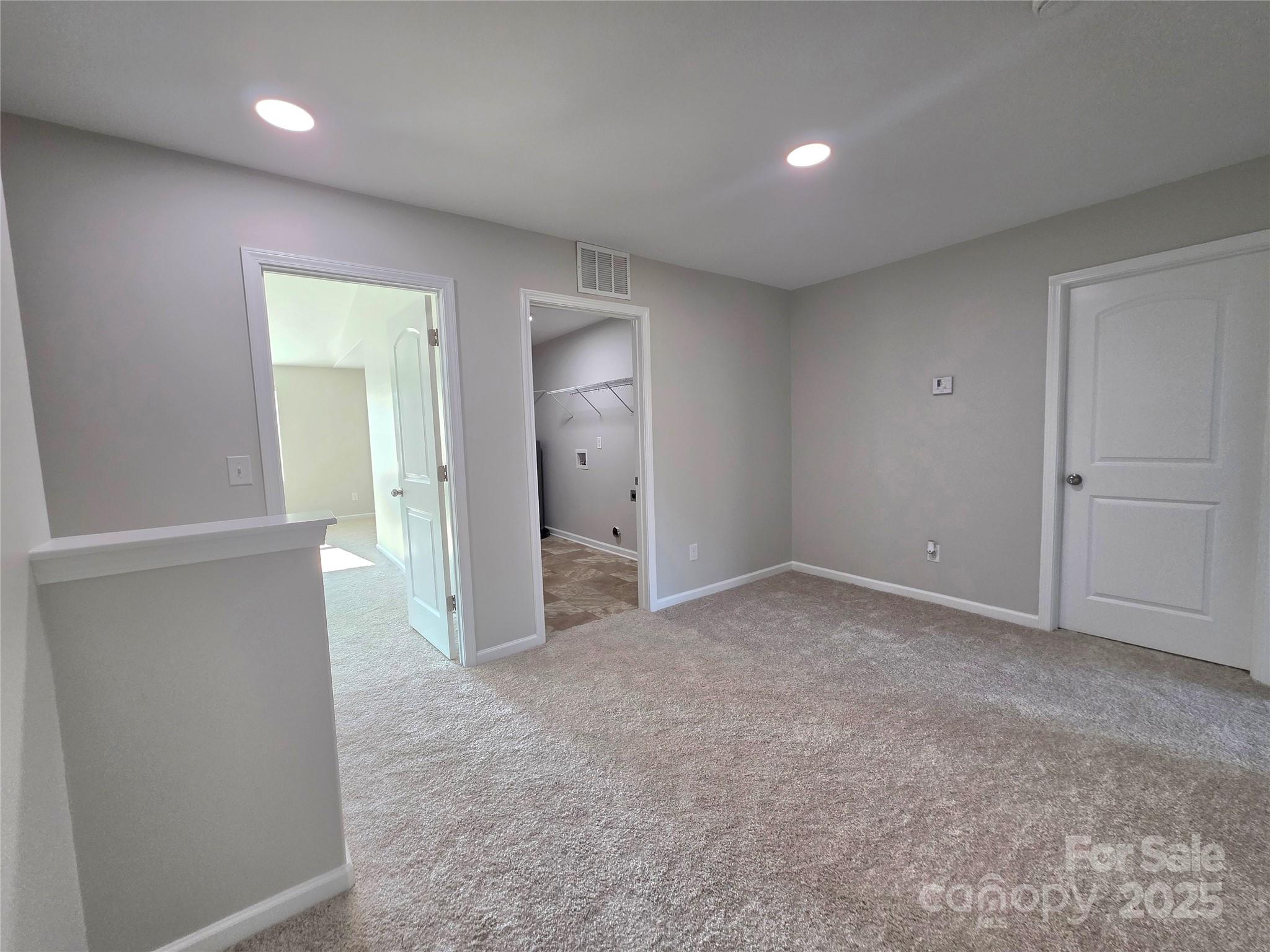 1047 Mackey Court Gastonia, NC 28056 - Photo 10 of 30 en empty room with an entryway and closet area