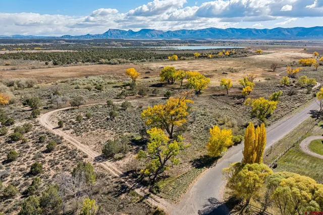 a view of an ocean and a mountain