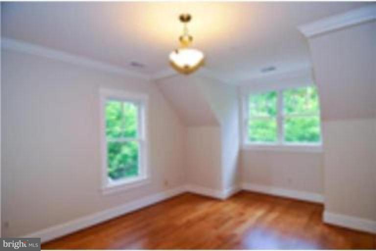 7816 Maple Ridge Road Bethesda, MD 20814 - Photo 2 of 16 a view of an empty room with a window