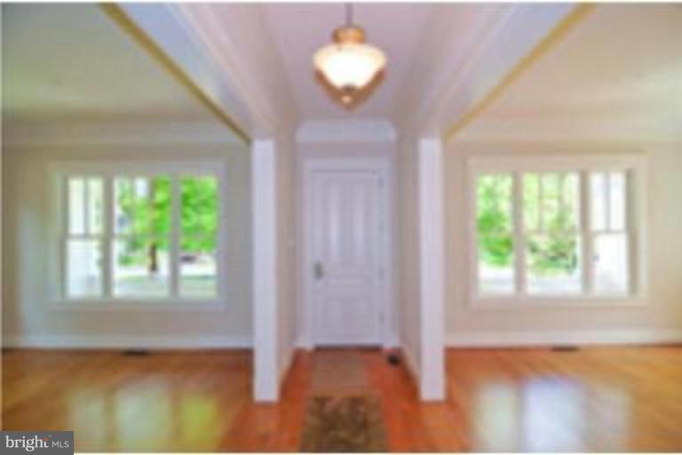 7816 Maple Ridge Road Bethesda, MD 20814 - Photo 4 of 16 a view of an empty room with a window
