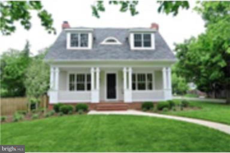 7816 Maple Ridge Road Bethesda, MD 20814 - Photo 6 of 16 a front view of a house with a yard