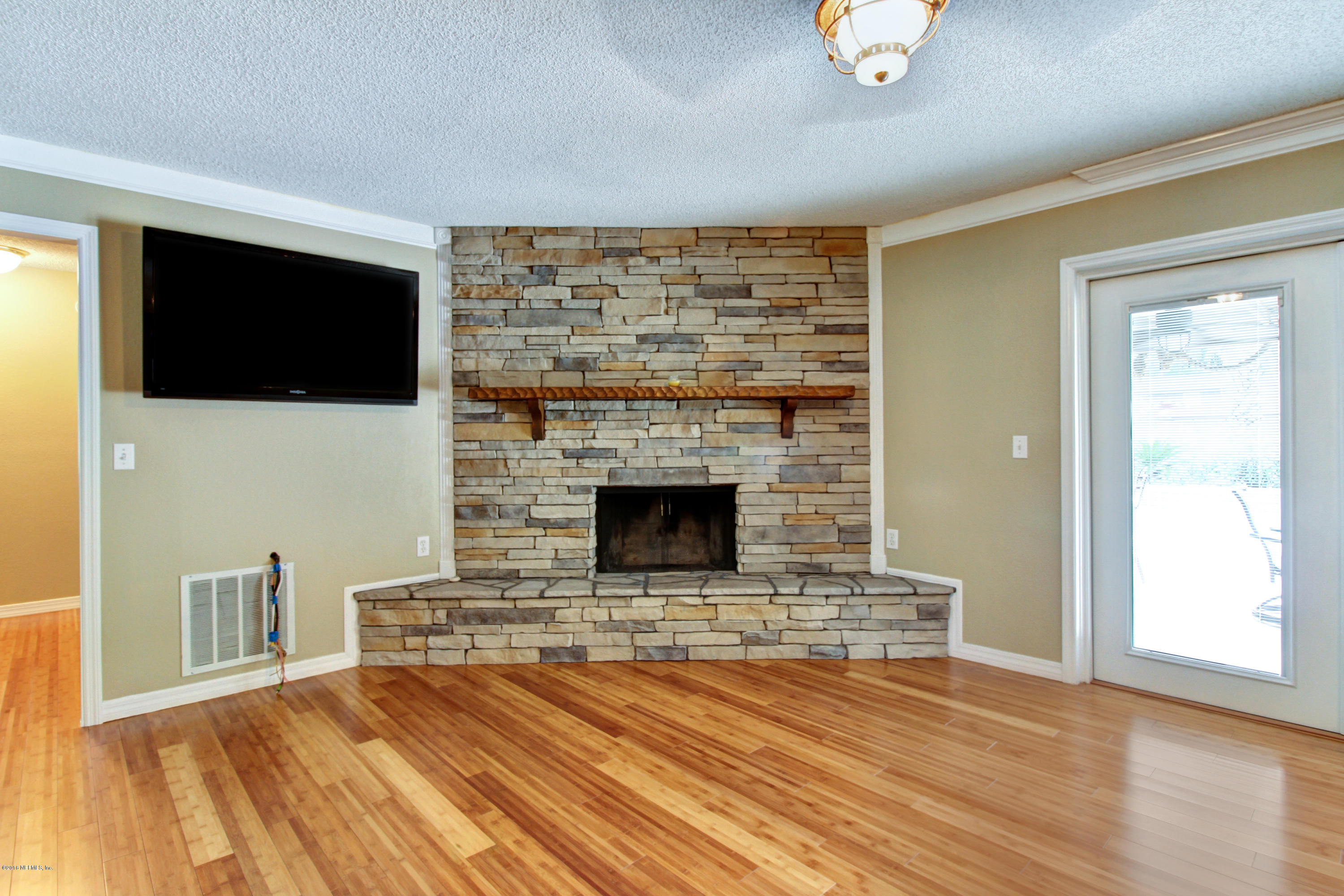 595 Rockingham Road Orange Park, FL 32073 - Photo 17 of 39 Stone Fireplace/Family Room