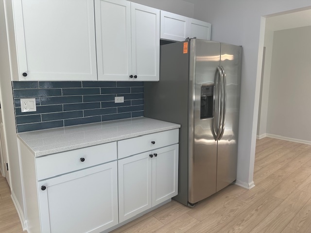 1311 Blue Ridge Parkway Algonquin, IL 60102 - Photo 7 of 21 a kitchen with cabinets and stainless steel appliances
