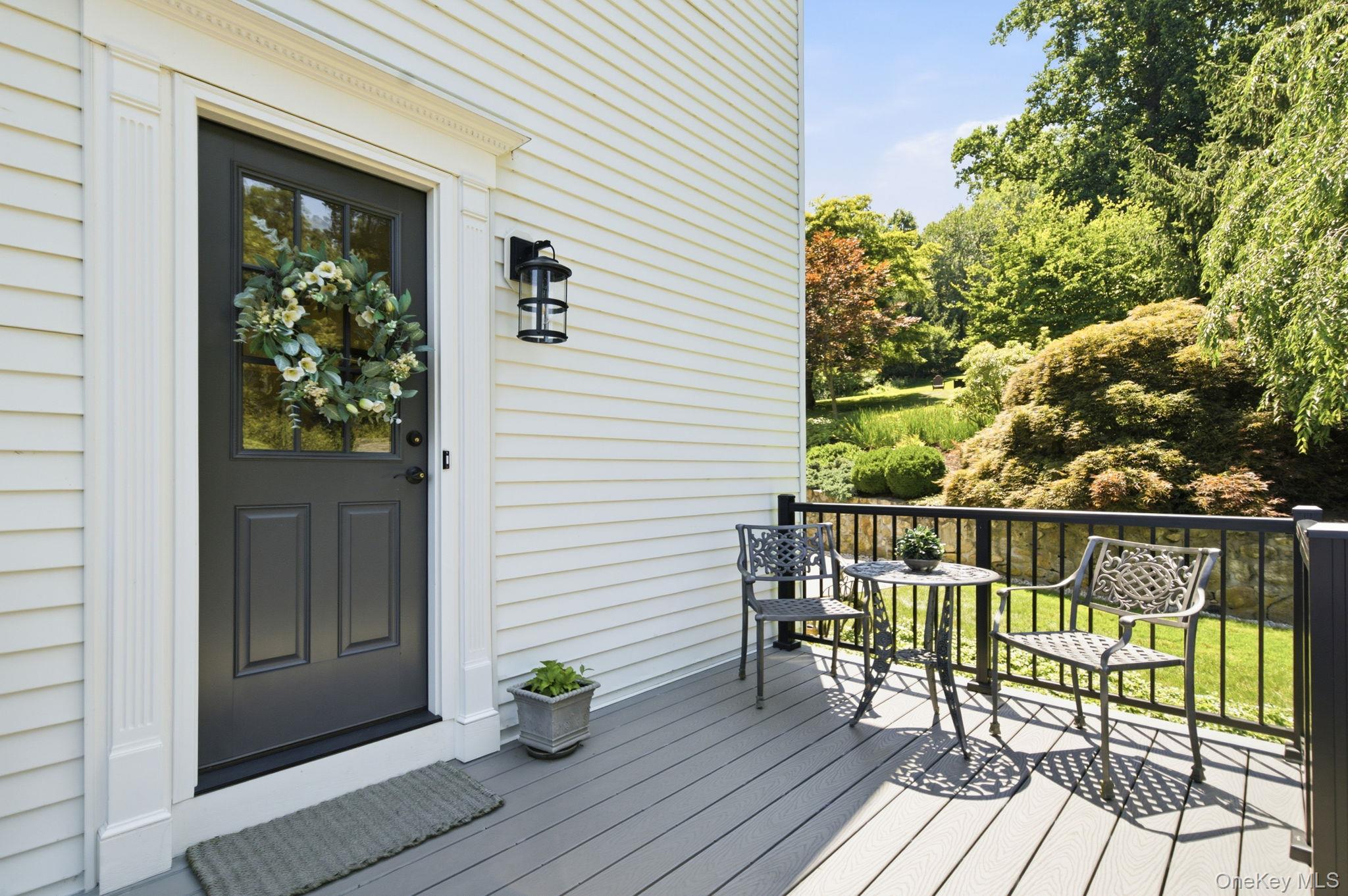 32 Bedell Road Katonah, NY 10536 - Photo 30 of 49 The new 2025 side door opens to the brand-new Trex deck.