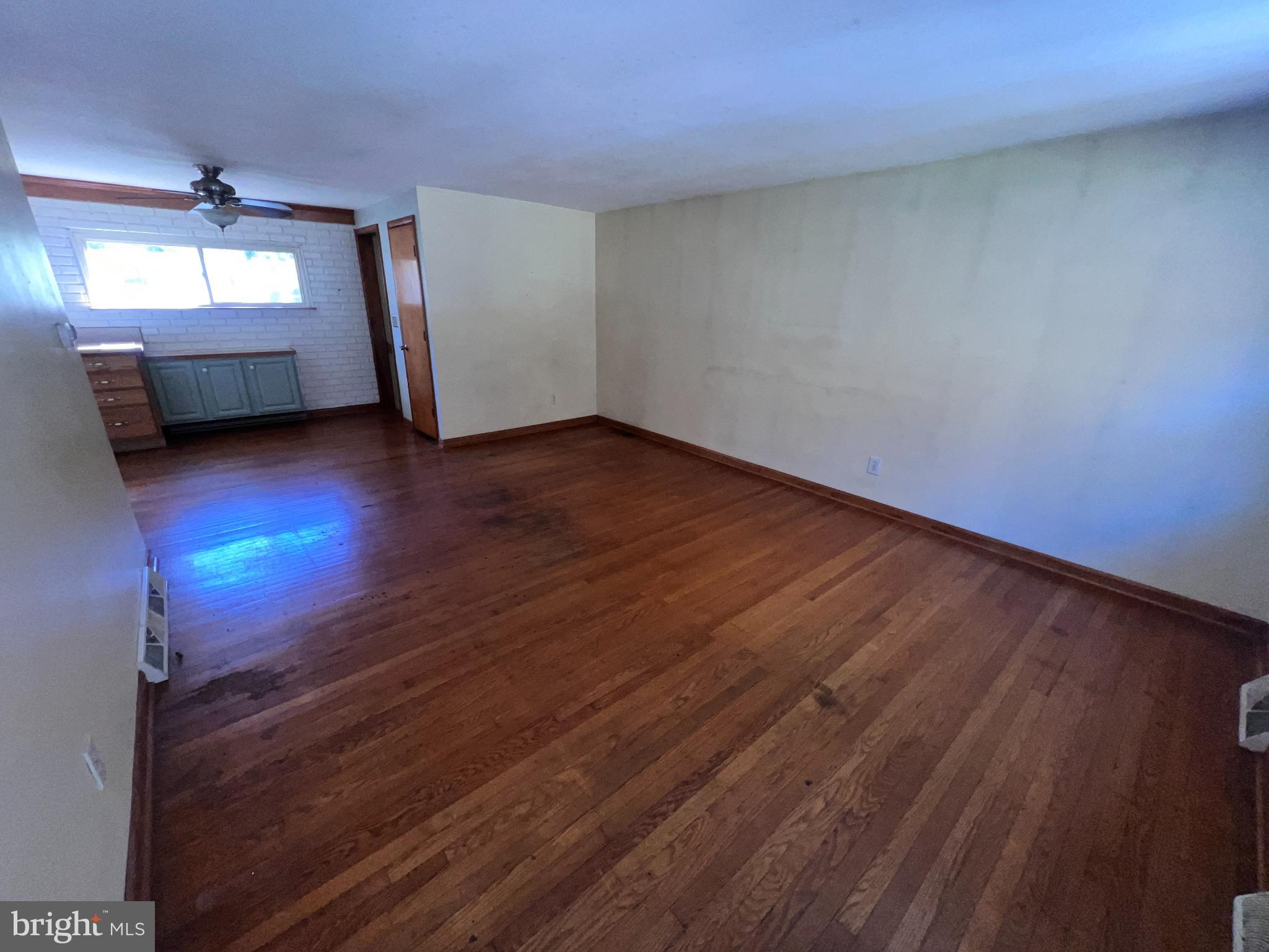 1074 Braddock Road Cumberland, MD 21502 - Photo 10 of 38 Living room opens to dining area and kitchen