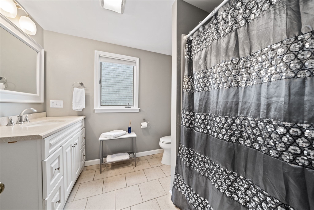 177 Turner Road Scituate, MA 02066 - Photo 17 of 38 a bathroom with a sink toilet and shower