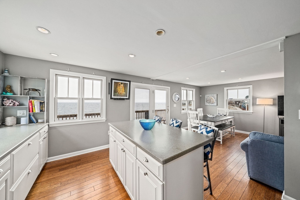 177 Turner Road Scituate, MA 02066 - Photo 8 of 38 a kitchen with stainless steel appliances granite countertop a sink stove and refrigerator