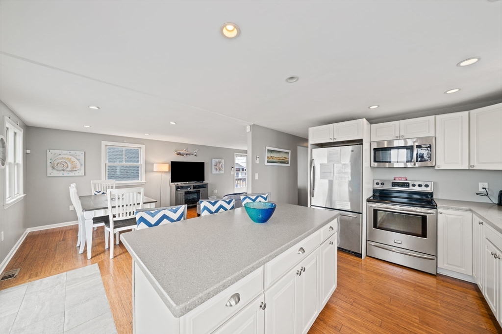 177 Turner Road Scituate, MA 02066 - Photo 9 of 38 a large white kitchen with cabinets