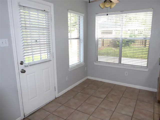 a view of an empty room with window