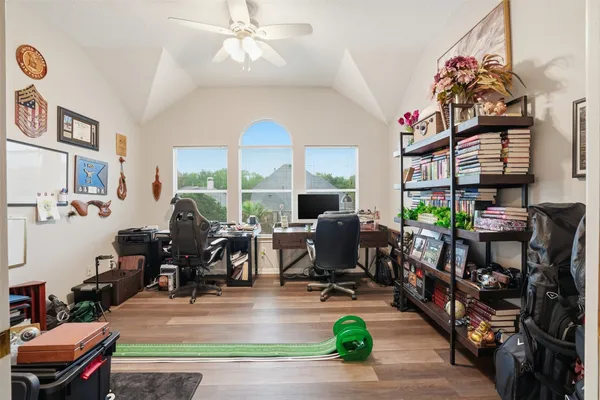 a view of a backyard with swimming pool