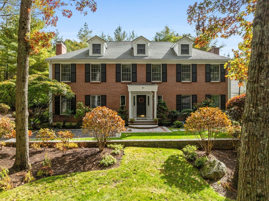 a front view of a house with swimming pool